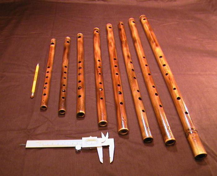Духовой деревянный инструмент флейта пана